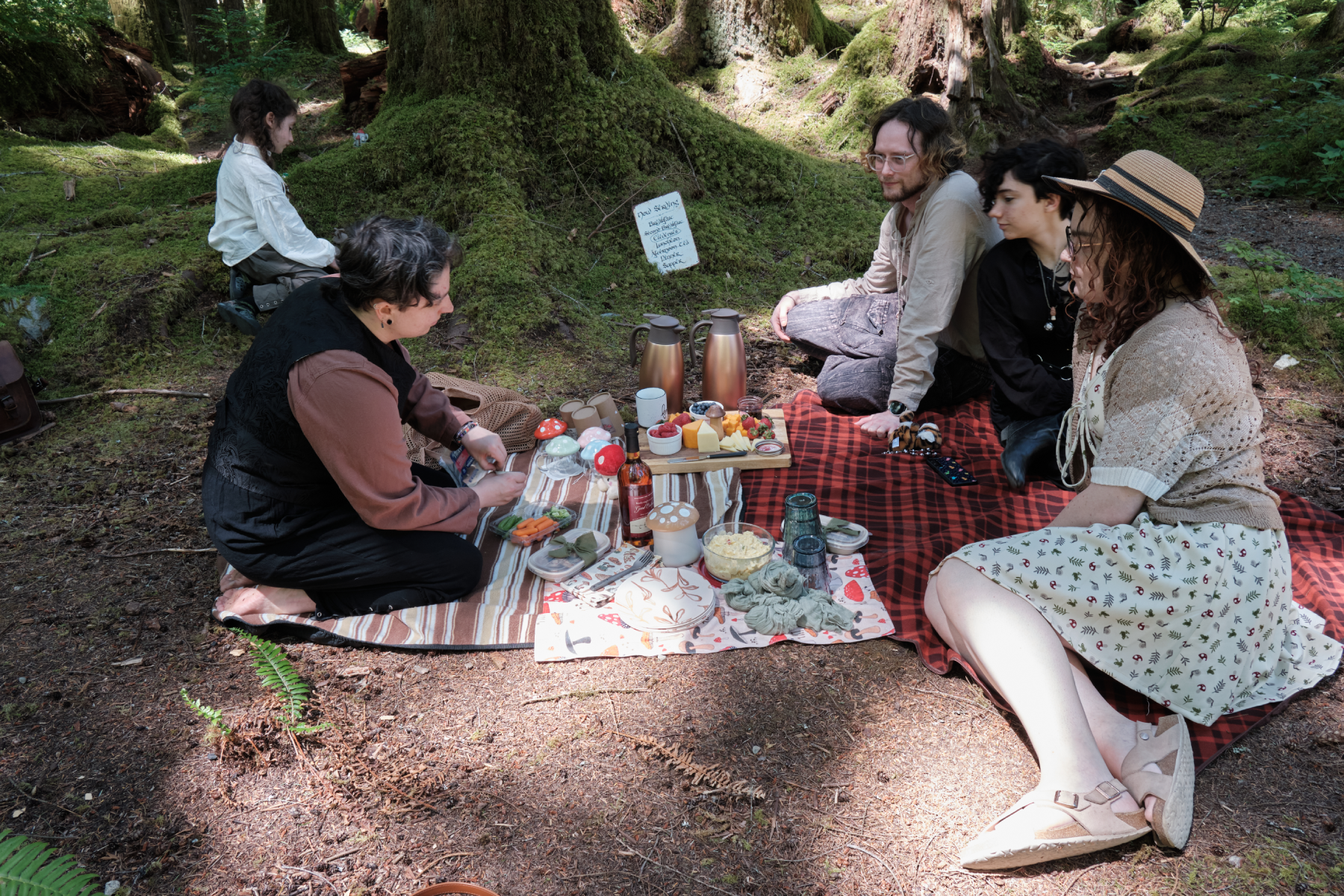 The Morel family having a picnic in the woods